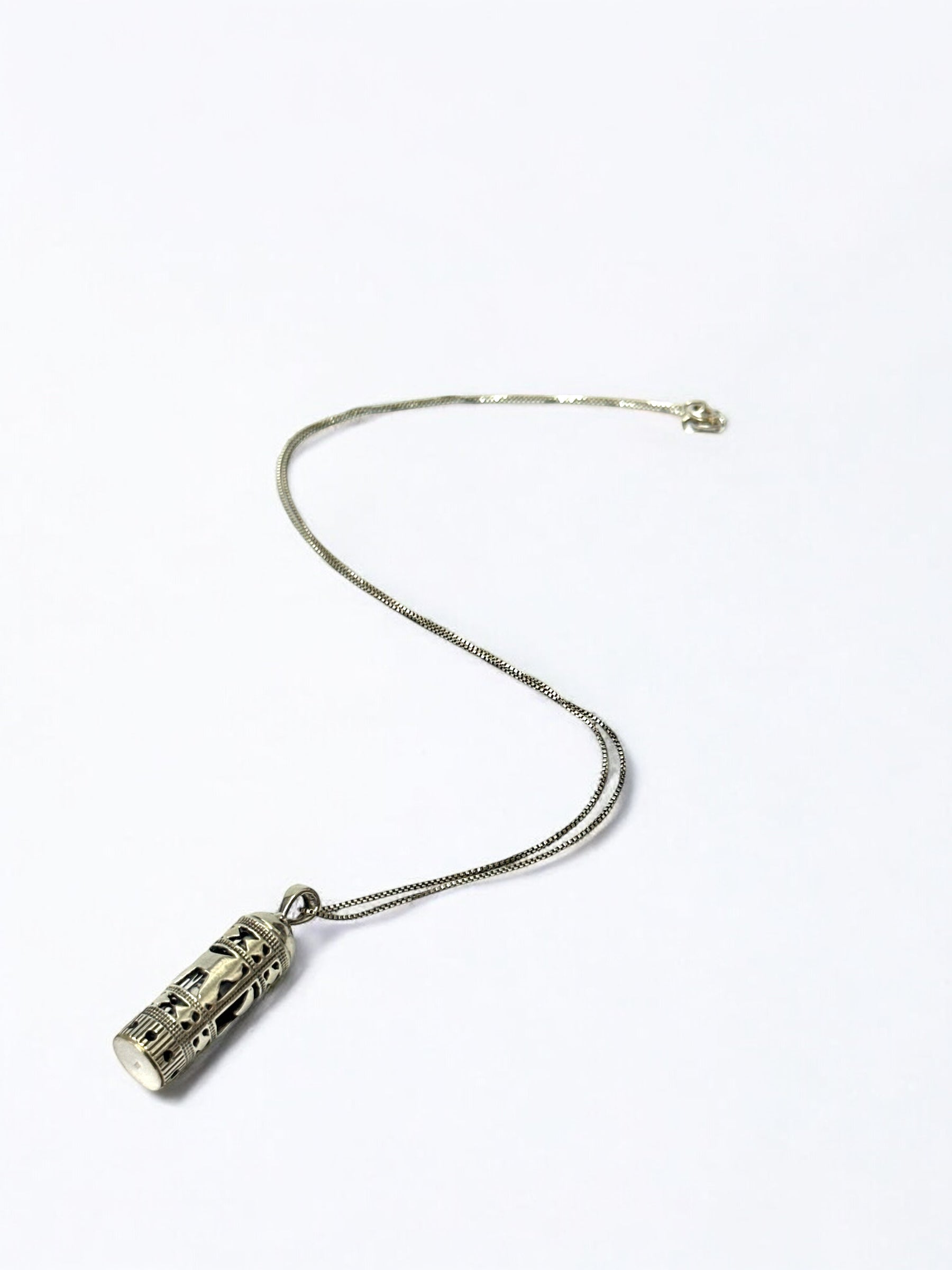 Close-up detail of mezuzah pendant design